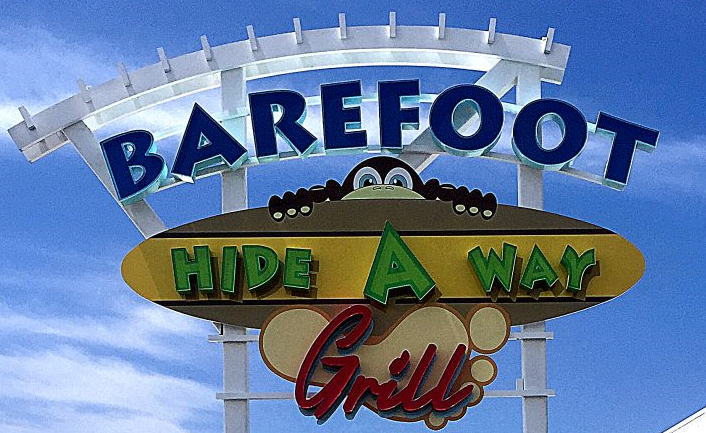 Barefoot Hideaway sign